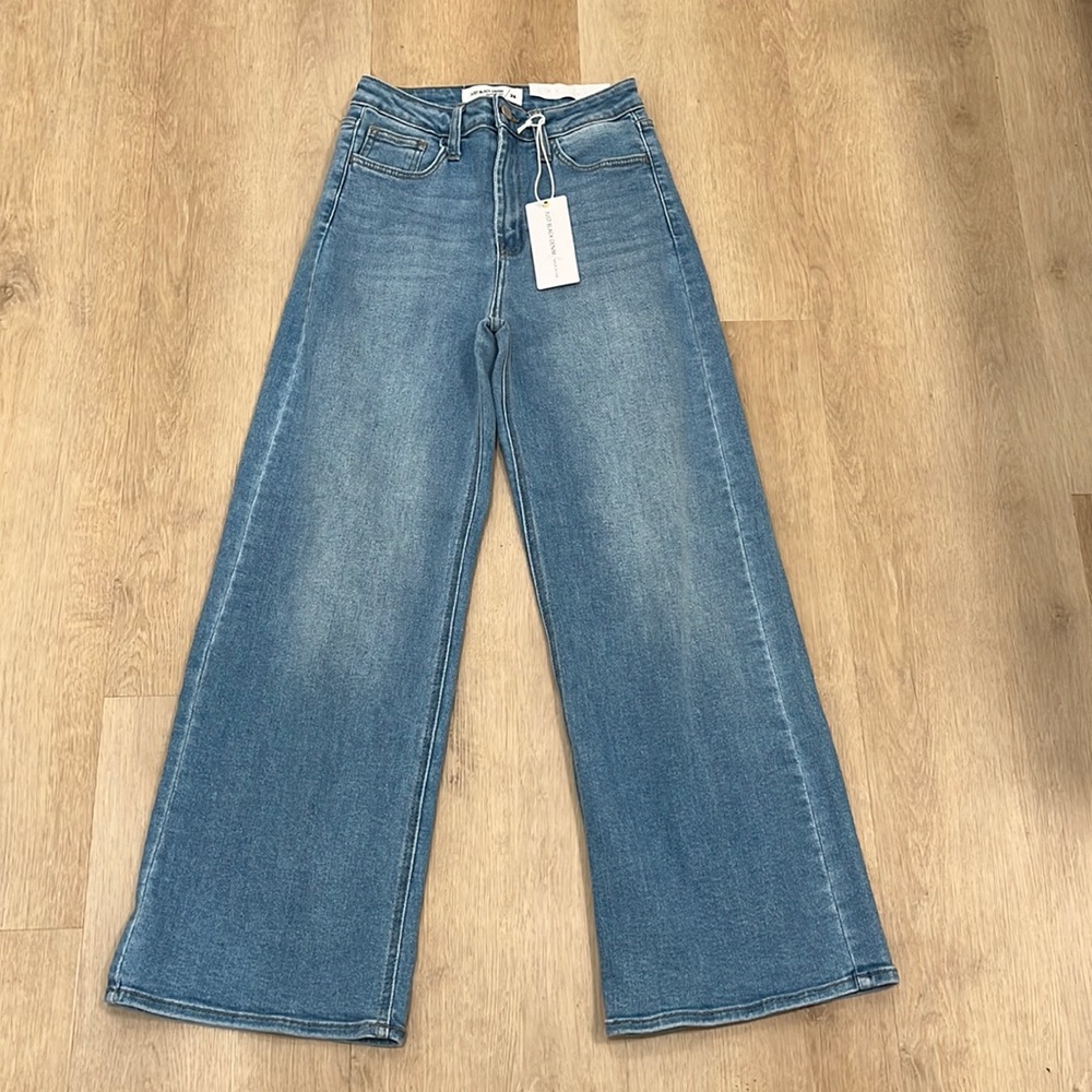 Just Black Denim, bought at Red Ribbon Boutique. Size 26. Medium wash.